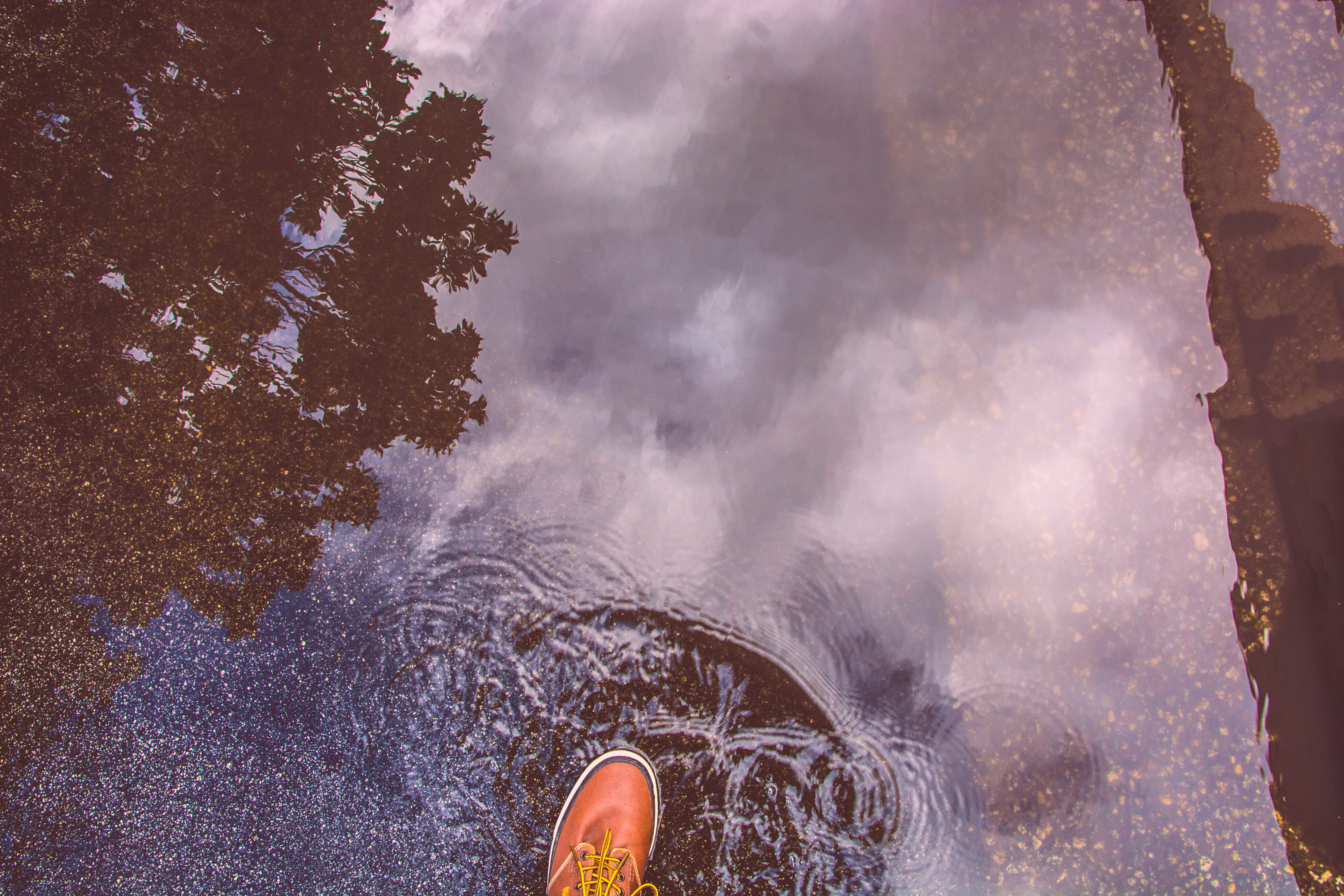 person stepping on water